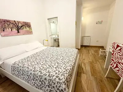 Letto o letti in una camera di B&B Floridiana