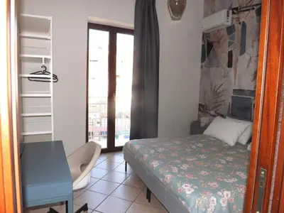 Letto o letti in una camera di IL MIGLIO