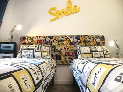 Letto o letti in una camera di M99 Design Rooms