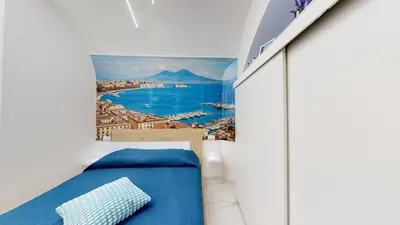 Letto o letti in una camera di Vesuvius Home