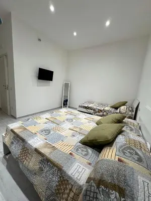 Letto o letti in una camera di Oliver's House