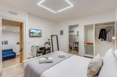 Letto o letti in una camera di Caravita Rooms