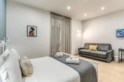 Letto o letti in una camera di Caravita Rooms