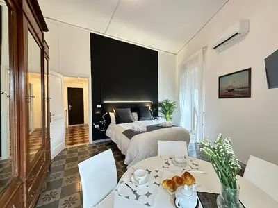 TV o dispositivi per l'intrattenimento presso Habitatio Mercatorum Guesthouse - LS Accommodations