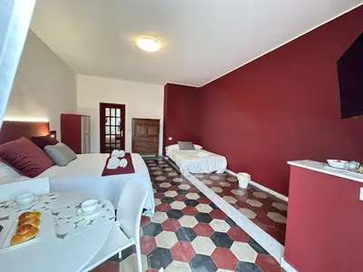 Letto o letti in una camera di Habitatio Mercatorum Guesthouse - LS Accommodations