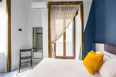 Letto o letti in una camera di Leticia's Apartment by Wonderful Italy