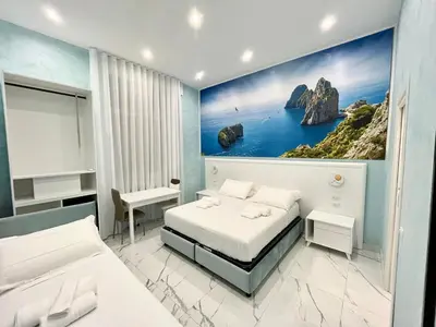 Letto o letti in una camera di DUOMO MIRADOIS 152 NAPOLI