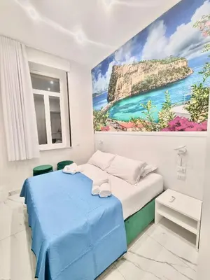 Letto o letti in una camera di DUOMO MIRADOIS 152 NAPOLI