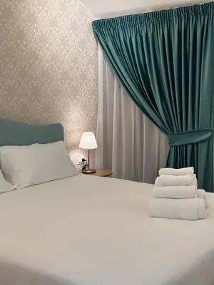 Letto o letti in una camera di I 5 Partenopei