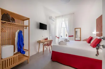 Letto o letti in una camera di VistaVicolo Rooms