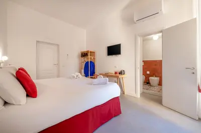 Letto o letti in una camera di VistaVicolo Rooms