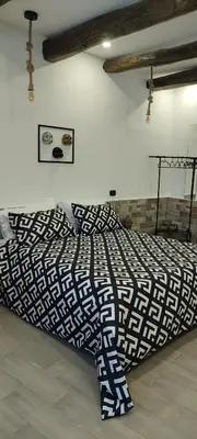 Letto o letti in una camera di Lulù Maison