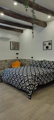 Letto o letti in una camera di Lulù Maison