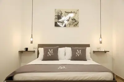 Letto o letti in una camera di Mia Napoli