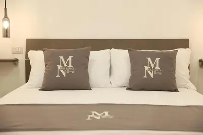 Letto o letti in una camera di Mia Napoli