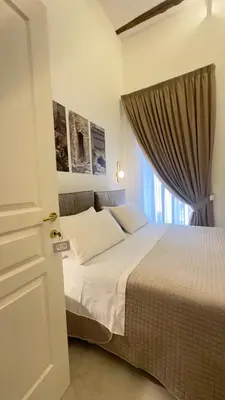 Letto o letti in una camera di Dimora Don Pasquale Napoli