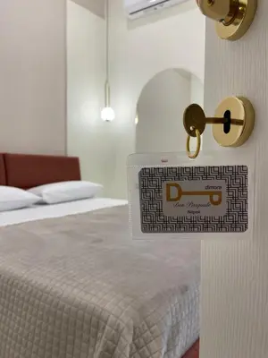 Letto o letti in una camera di Dimora Don Pasquale Napoli