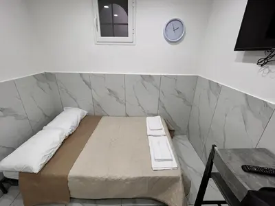 Letto o letti in una camera di Casa emmanuel