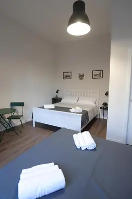 Letto o letti in una camera di Tammurriata Nera Bedroom