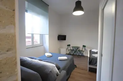 TV o dispositivi per l'intrattenimento presso Tammurriata Nera Bedroom