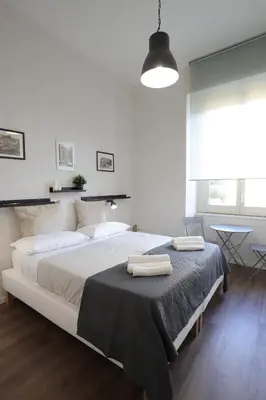 Letto o letti in una camera di Tammurriata Nera Bedroom