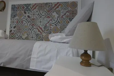 Letto o letti in una camera di Tinellari Rooms