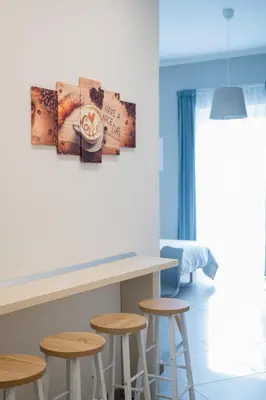 Area soggiorno di Tinellari Rooms