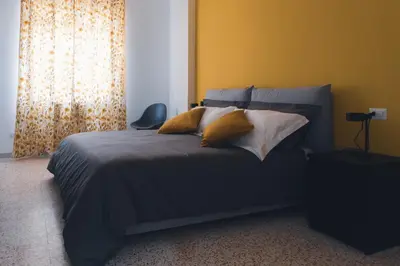 Letto o letti in una camera di La casa tra i monumenti