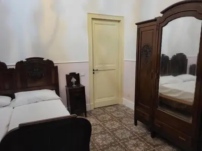 Letto o letti in una camera di ART HOUSE VENUSIO Naples