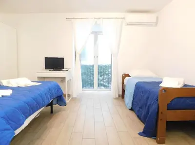 Letto o letti in una camera di Appartamento Quartieri Spagnoli