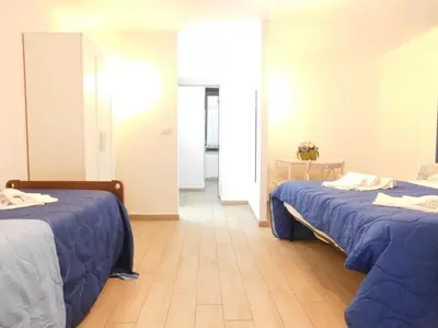 Letto o letti in una camera di Appartamento Quartieri Spagnoli