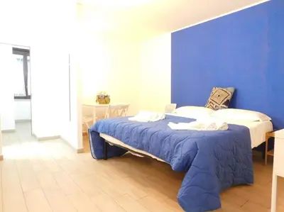 Letto o letti in una camera di Appartamento Quartieri Spagnoli
