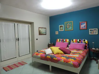 Letto o letti in una camera di Sinfonia di Napoli