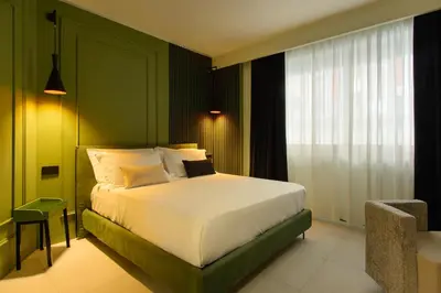 Letto o letti in una camera di Welmy Napoli