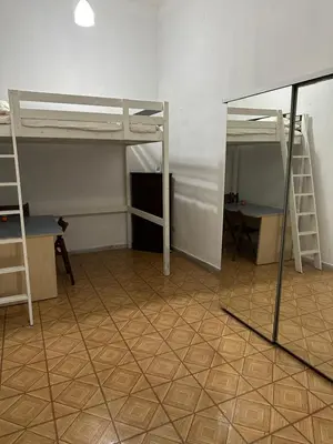 Letto o letti a castello in una camera di EAT SLEEP &LoVE