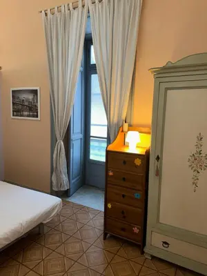 Letto o letti in una camera di EAT SLEEP &LoVE