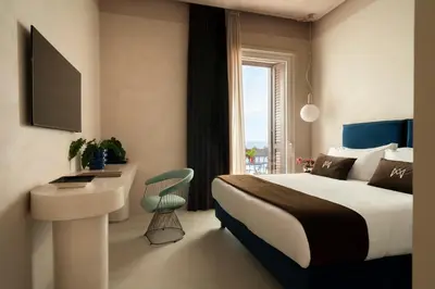 Letto o letti in una camera di Demetra Luxury Suites