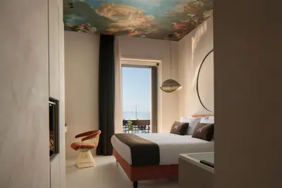 Letto o letti in una camera di Demetra Luxury Suites