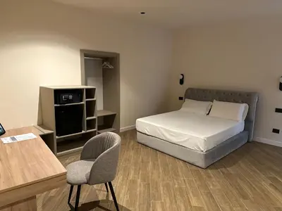 Letto o letti in una camera di Maison Toledo Suites