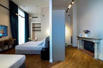 Letto o letti in una camera di Maison Toledo Suites