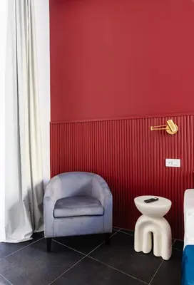 Area soggiorno di Epoca Suites Napoli