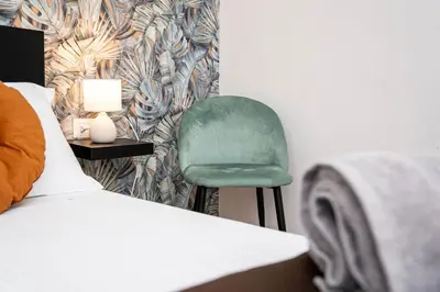 Letto o letti in una camera di Domus Carmela