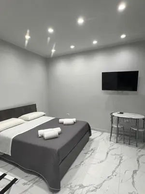Letto o letti in una camera di holiday house Maria francesca