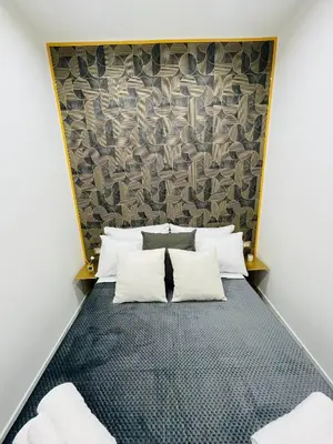 Letto o letti in una camera di Frank Anthony Home