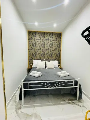 Letto o letti in una camera di Frank Anthony Home