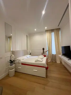 Letto o letti in una camera di Raffaella Home