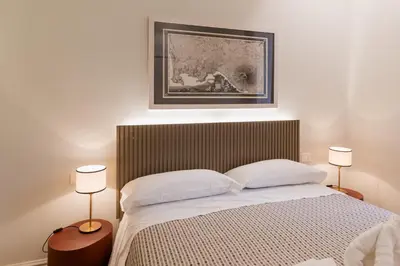 Letto o letti in una camera di Piazza San Domenico Luxury Suites