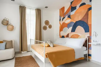 Letto o letti in una camera di Neapolis Guest House