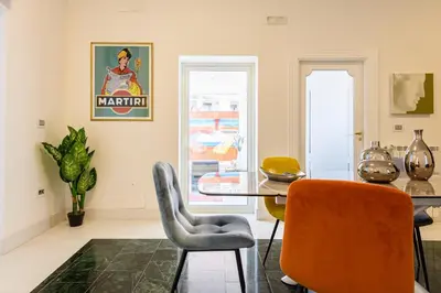Area soggiorno di Amazing and central penthouse with terraces in the heart of Napoli