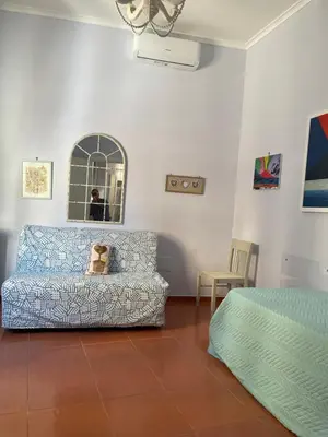 Letto o letti in una camera di Casa da “Nonna Iolanda” Napoli centro storico